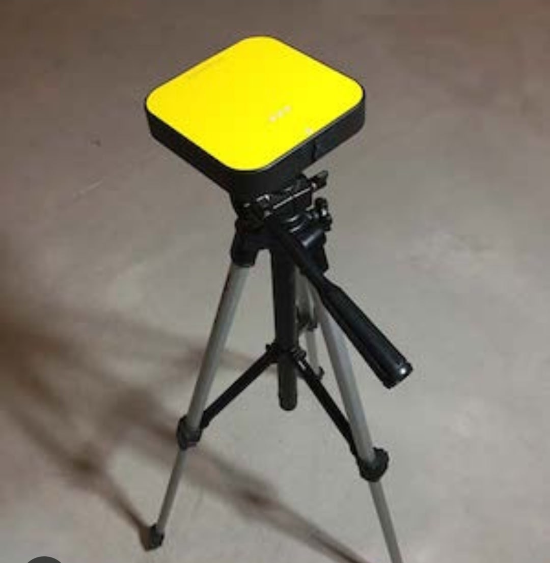 Radon monitor on tripod for certified long-term testing